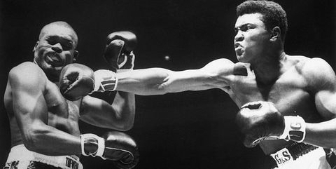 Boxer Cassius Clay Punching Doug Jones