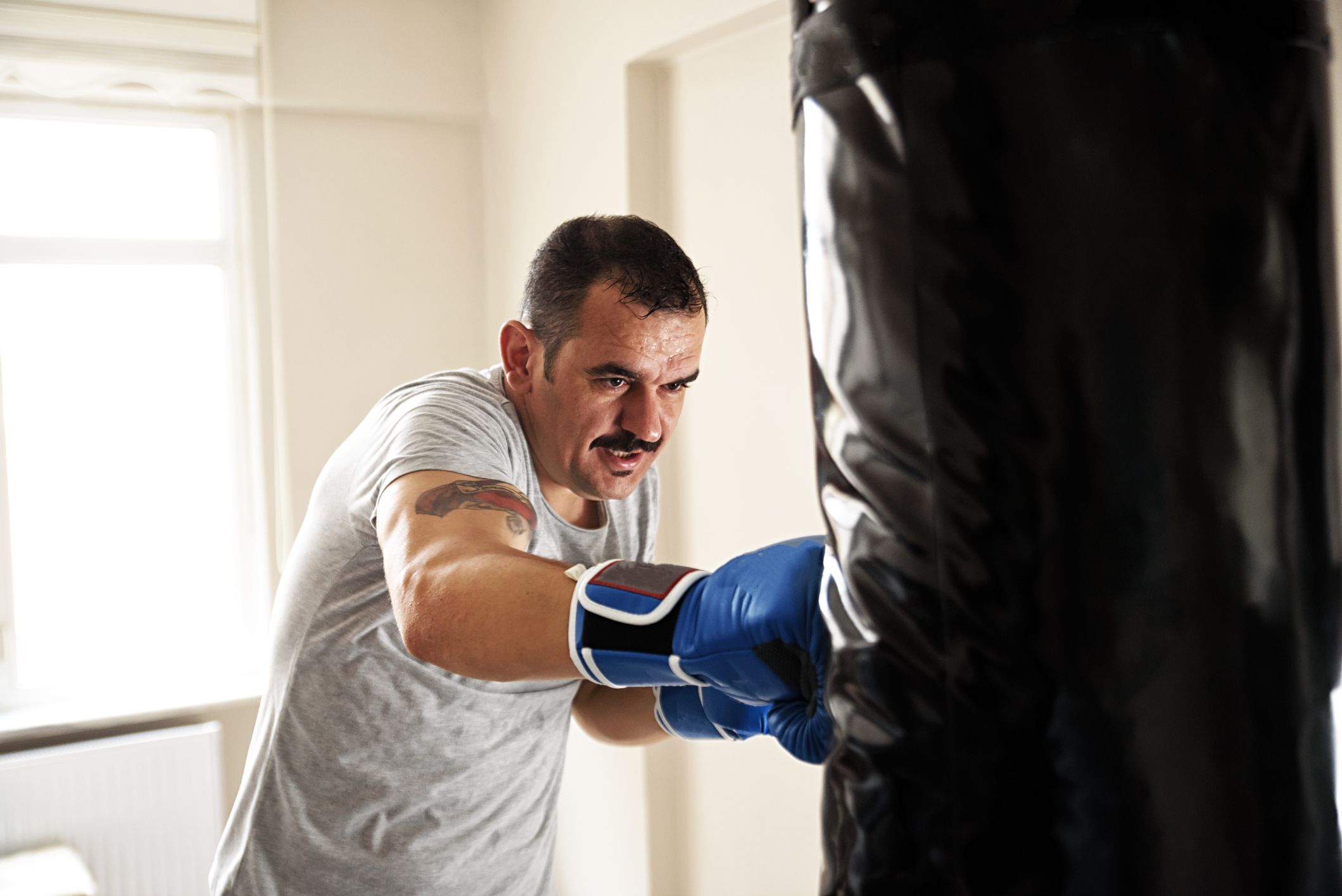 gym with heavy bag