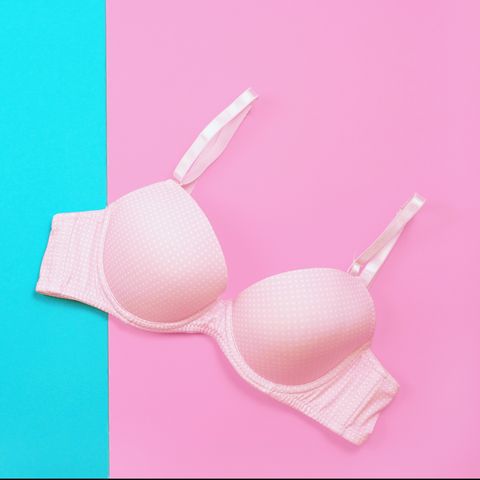 bra on hanger on two tone background