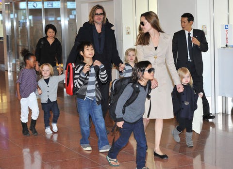 tokyo, japan november 08 brad pitt, angelina jolie and their six children maddox, pax, zahara, shiloh, knox, and vivienne arrive at haneda international airport on november 8 in tokyo, japan photo by jun satowireimage