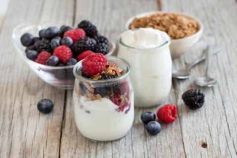 Breakfast with Fresh greek yogurt, muesli and berries