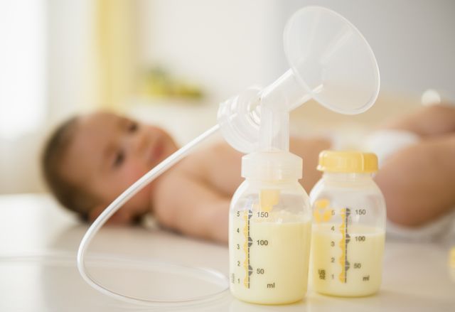breast pump next to baby