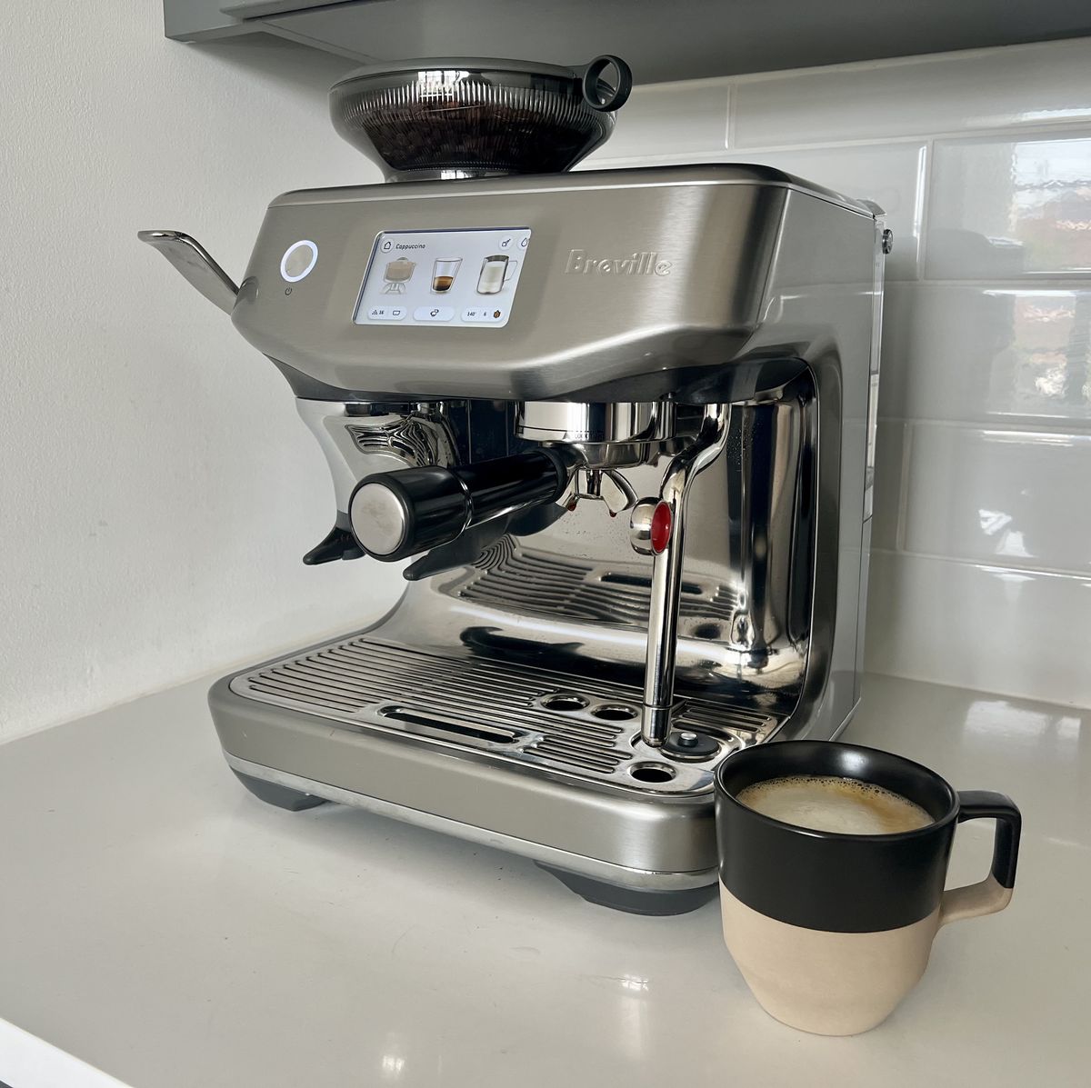 https://hips.hearstapps.com/hmg-prod.s3.amazonaws.com/images/breville-barista-touch-impress-lead-64d15e6aea099.jpg?crop=0.752xw:1.00xh;0.125xw,0&resize=1200:*