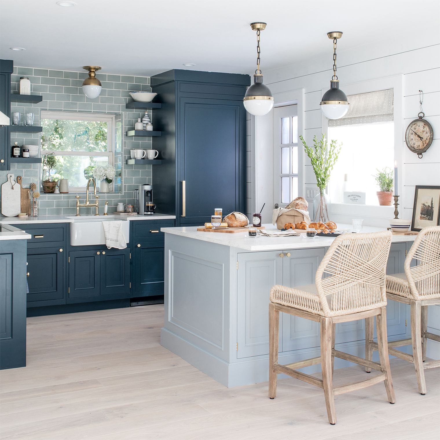 light blue kitchen with dark cabinets