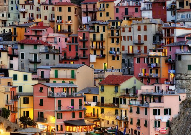 brightly coloured architecture in manarola, liguria, italy