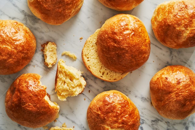 brioche buns on a white marble background