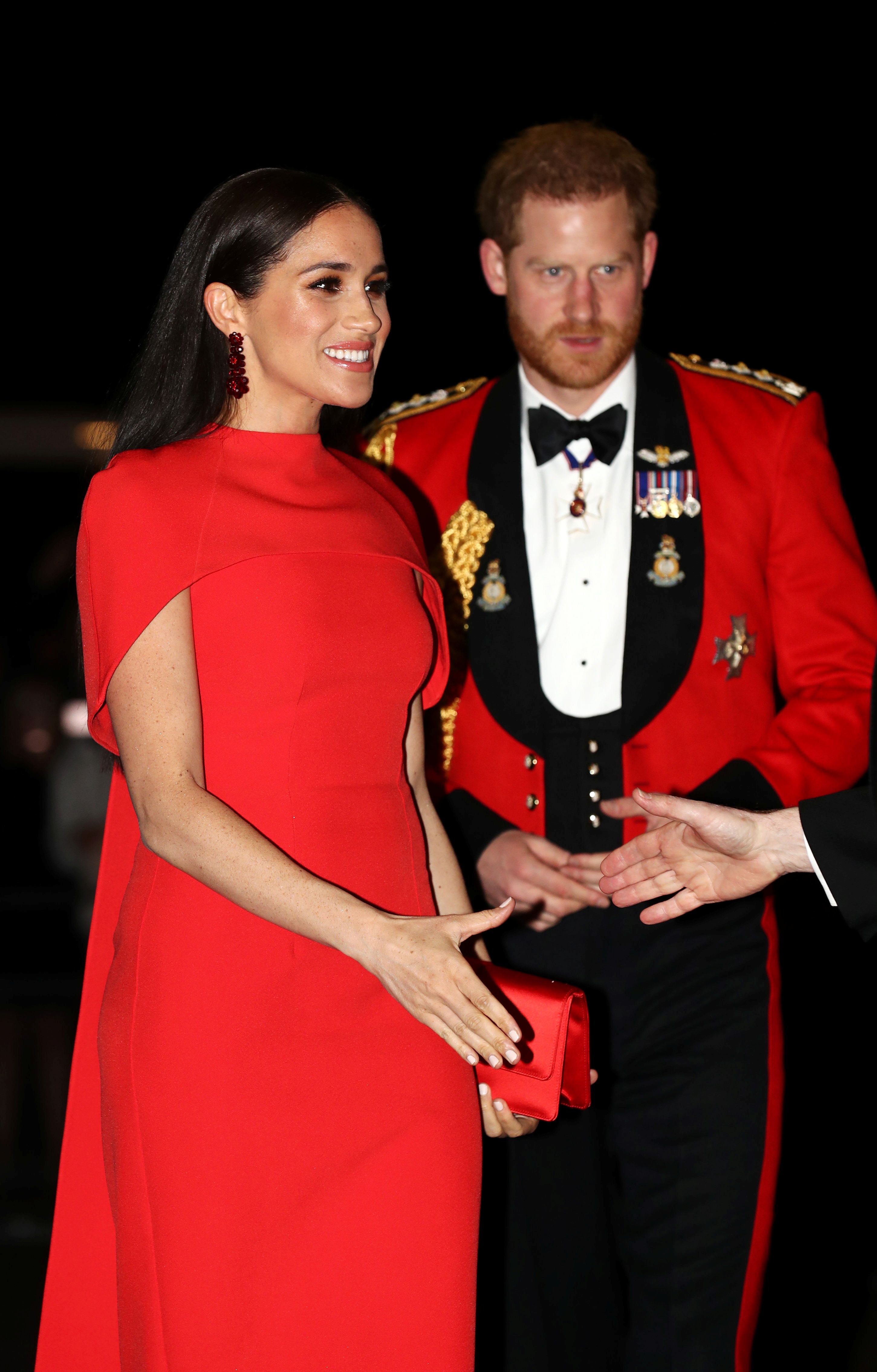 Meghan Markle Stuns in a Gorgeous Red 