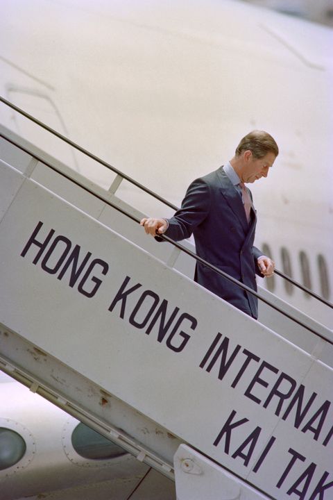 prince of wales steps off the plane on his arrival at kai tai airport at hong kong on june 28, 1997