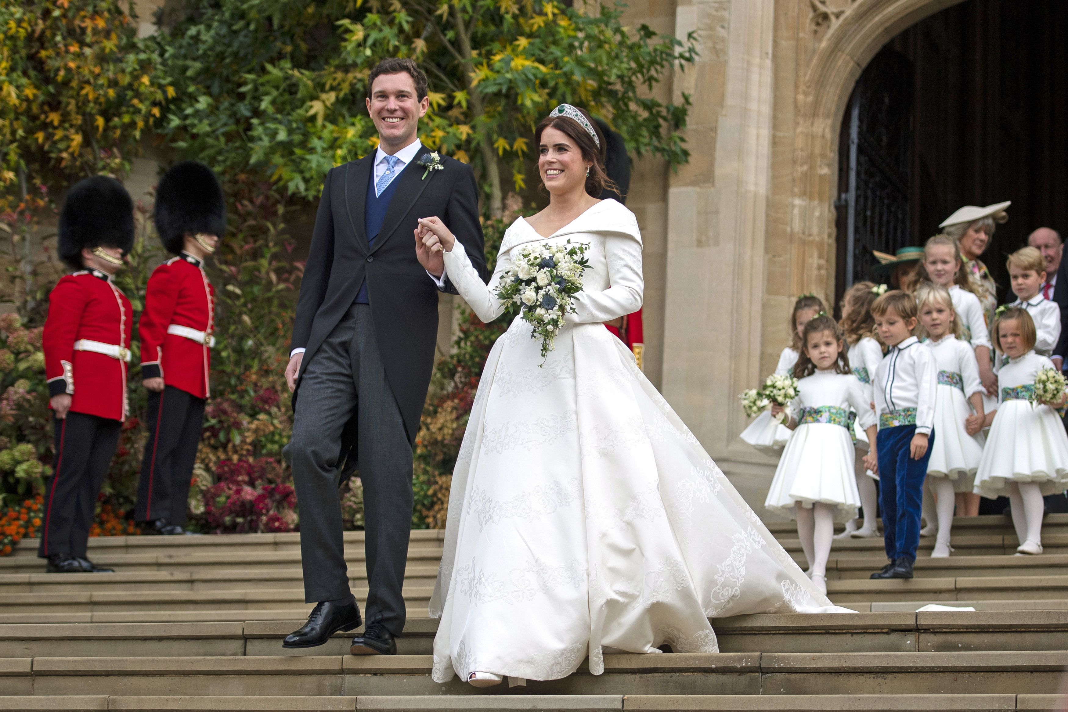 Princess Eugenie defies royal tradition in a mini dress and a biker jacket for her festival reception