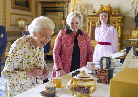 the queen inspects the precious artefacts at windsor castle on thursday