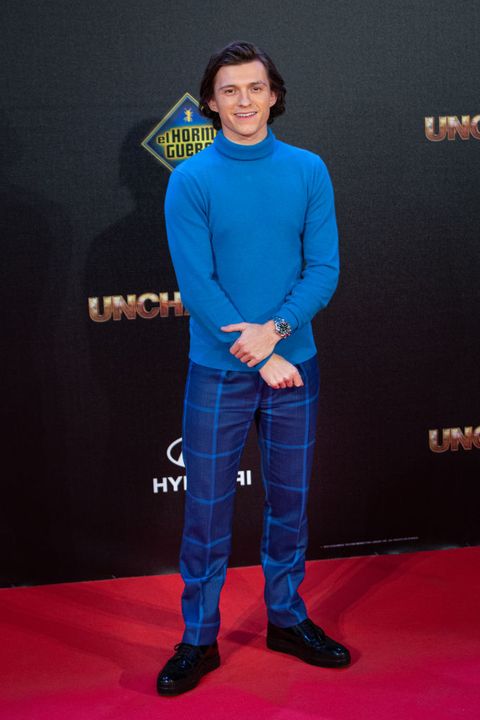 tom holland attends "uncharted" madrid premiere