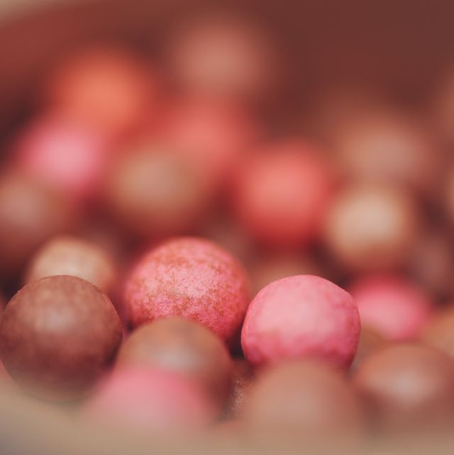 blush pink and bronze balls close up,selective focus