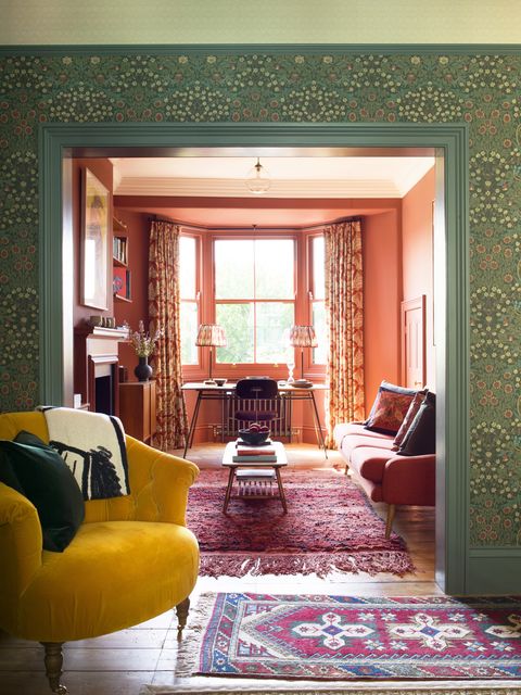 living room of victorian townhouse in bruton with william morris wallpaper