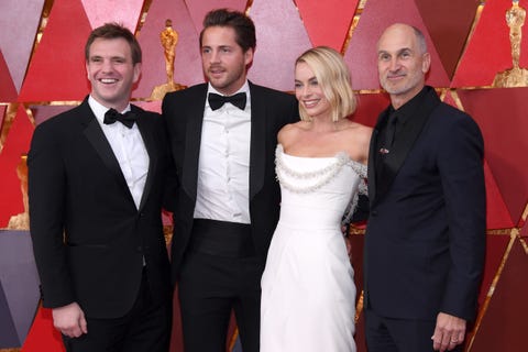 tom ackerley and margot robbie at the 90th Annual Academy Awards tom ackerley and margot robbie at the 90th annual academy awards