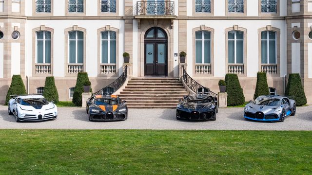 bugattis in front of mansion