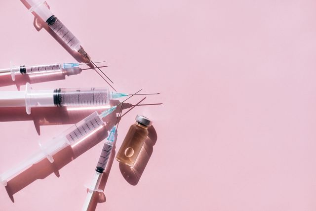 bunch of syringes near vial of drug vaccination is the most anticipated procedure of the year