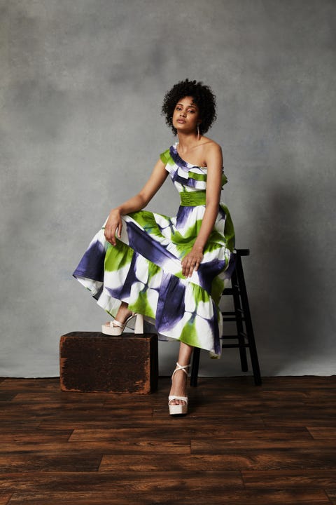 a model wears a green and purple hand dyed dress made by busayo olupona