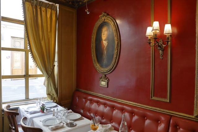 the cafe procope interior in paris with portraits of famous writers and revolutionary politicians benjamin franklin, jean jacques rousseau, robespierre, danton, voltaire, d'alembert, diderot, marat, moliere engraving, paris, france photo by joe sohmvisions of americauniversal images group via getty images