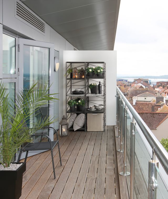 modern high rise apartment balcony with views over town