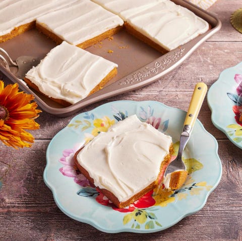 pumpkin sheet cake with slice on floral plate