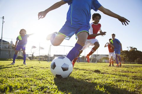 Ball, Football, Sports equipment, Soccer ball, Grass, Fun, Green, Soccer, Playing sports, Soccer player, 