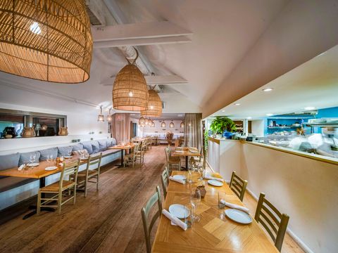 the interior of the restaurant calissa in the hamptons