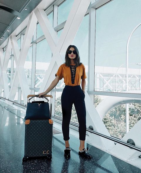Editor aparato estoy de acuerdo Cómo vestir (con estilo) para viajar según las que más viajan: las  instagramers de moda - Qué ropa lucir para viajar