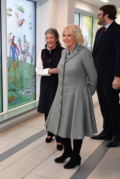 camilla-duchess-of-cornwall-looks-at-a-new-stained-glass-news-photo-1581436739.jpg