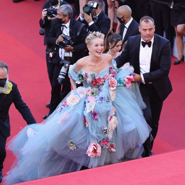 cannes, france   july 14 sharon stone and milutin gatsby  attend the 