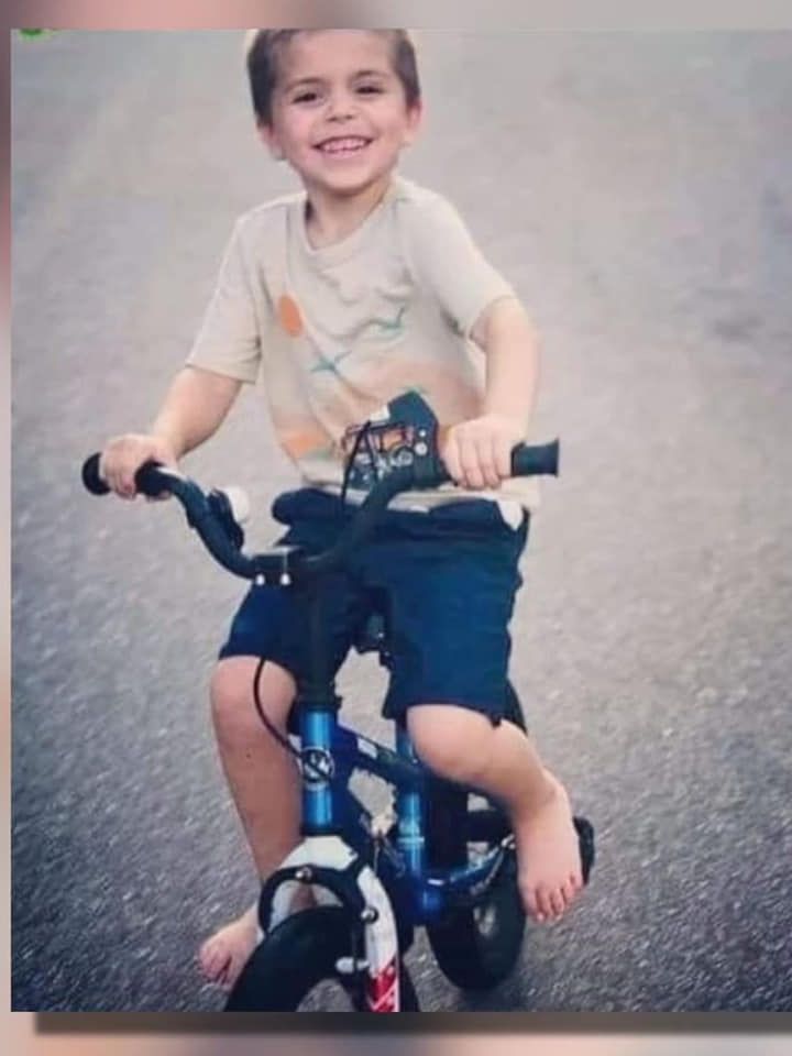 child on bike