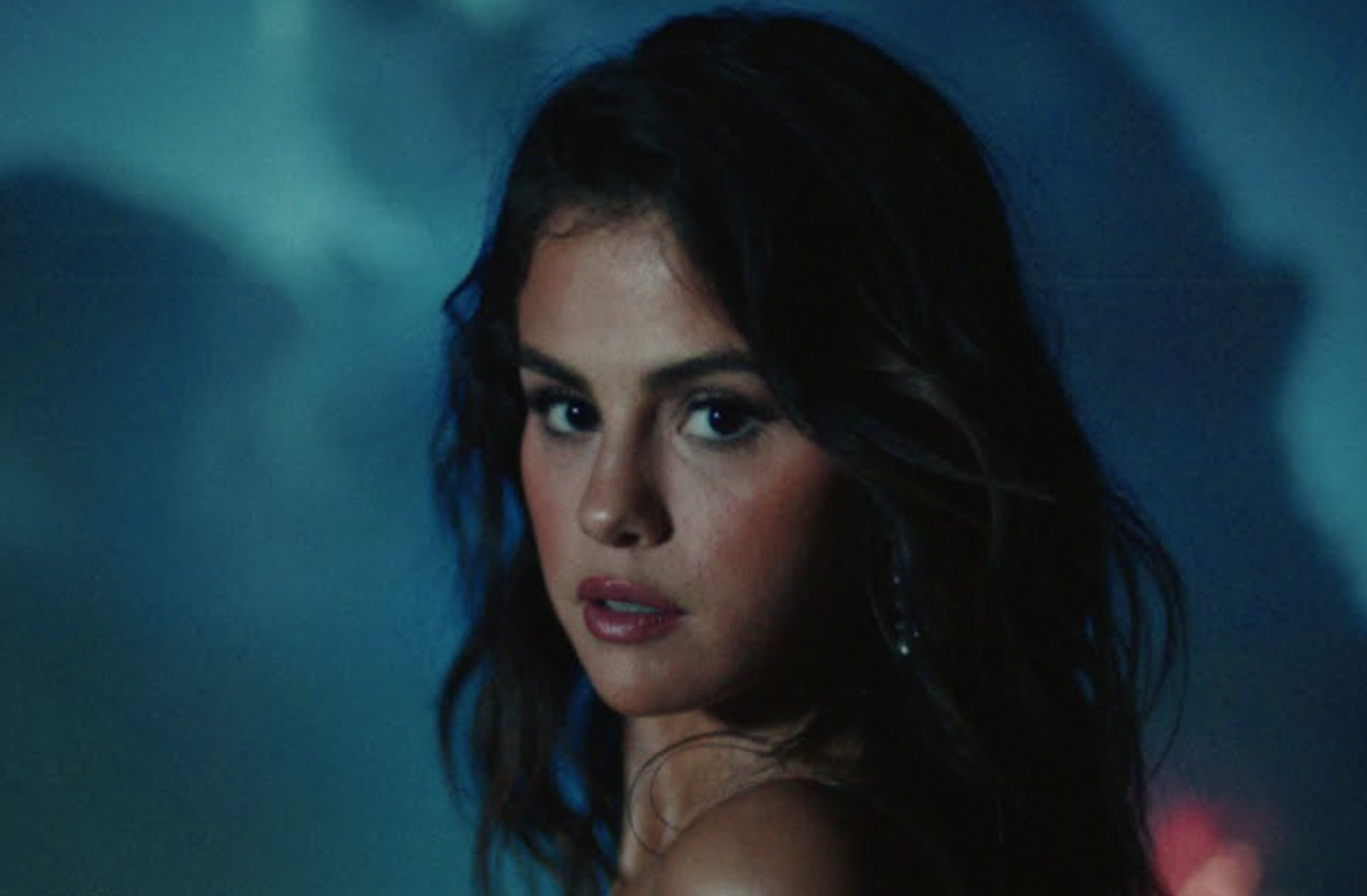 Selena Gomez and Rauw Alejandro’s ‘Baila Conmigo’ Lyrics Capture the Thrill of New Love