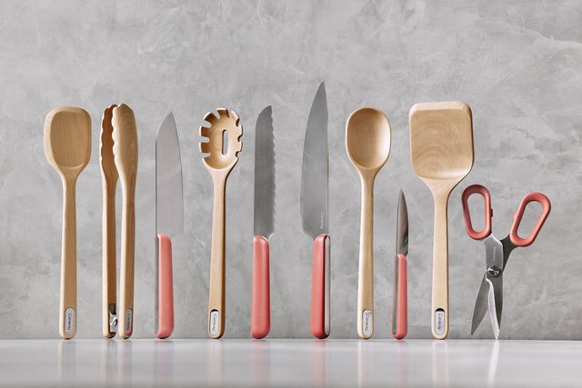 colorful knives and wooden kitchen utensils
