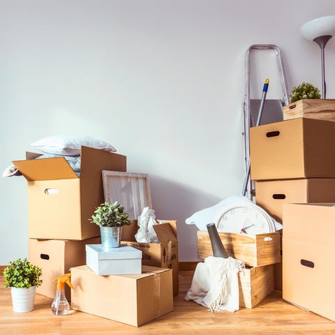 cardboard boxes and cleaning things for moving into a new home