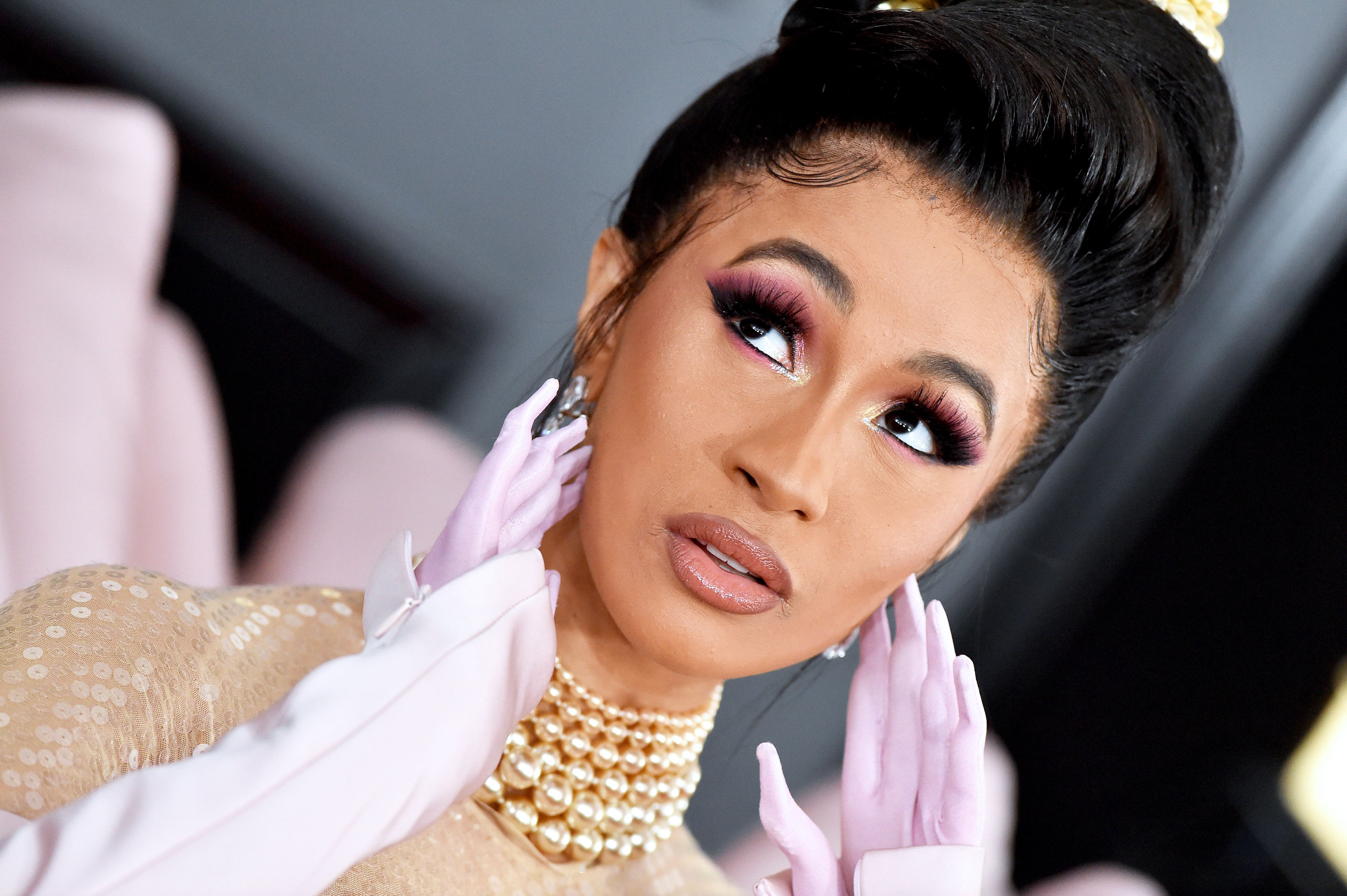 Cardi B S Breast Implants Help Her Float Because She Can T Swim