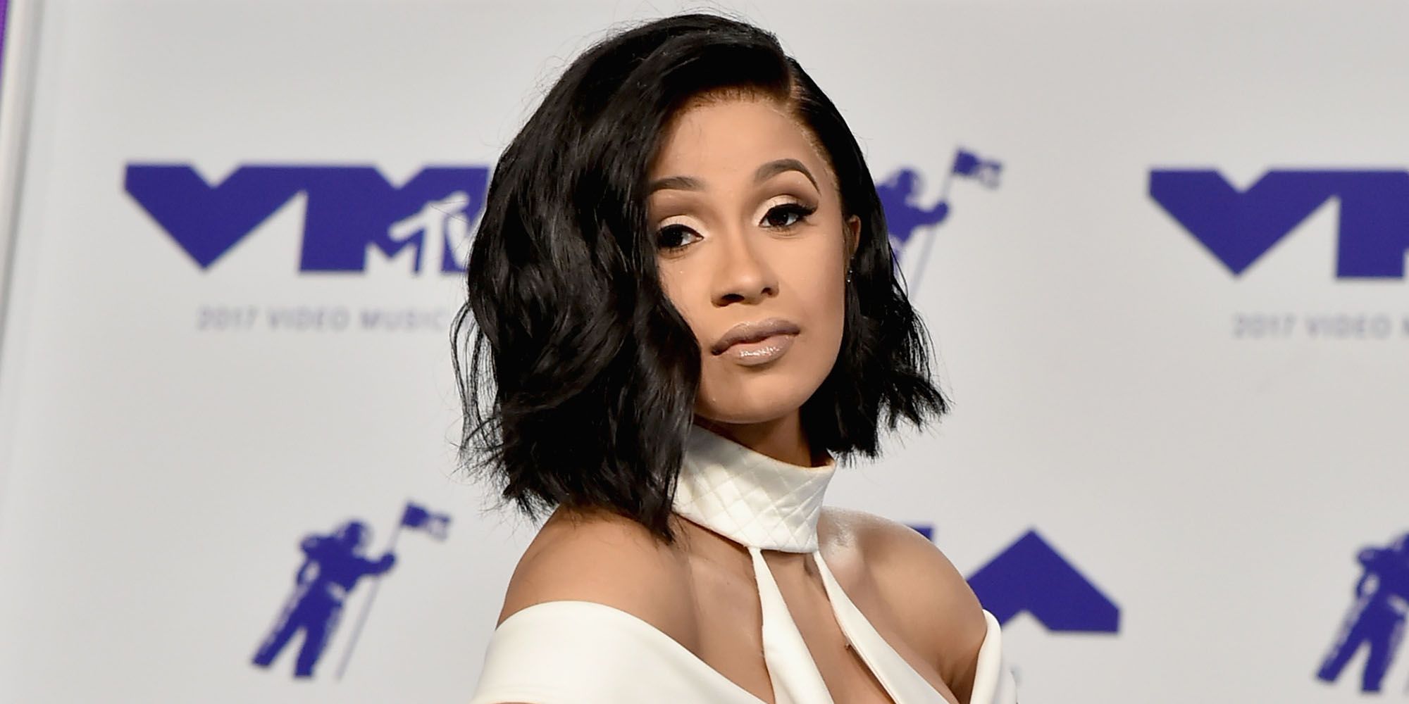 Guys, Cardi B just made founding father low ponytails cool
