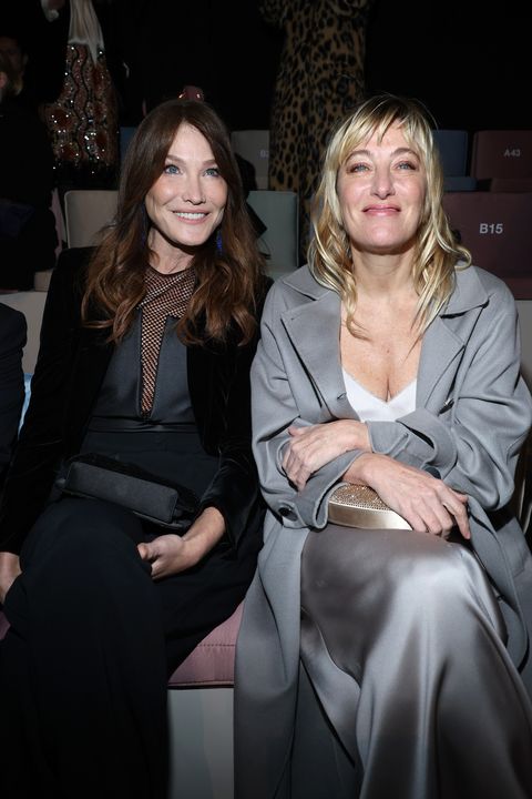 ﻿Carla Bruni and Valeria Bruni Tedesco sit front row at the Giorgio Armani privè at Paris Fashion Week 2023