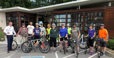 dr cooley at a bike walk knoxville ride event in 2019 with elected officials