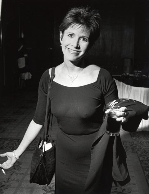 Carrie Fischer Birthday Best Style Moments In Memoriam Carrie Fisher S Most Iconic Looks