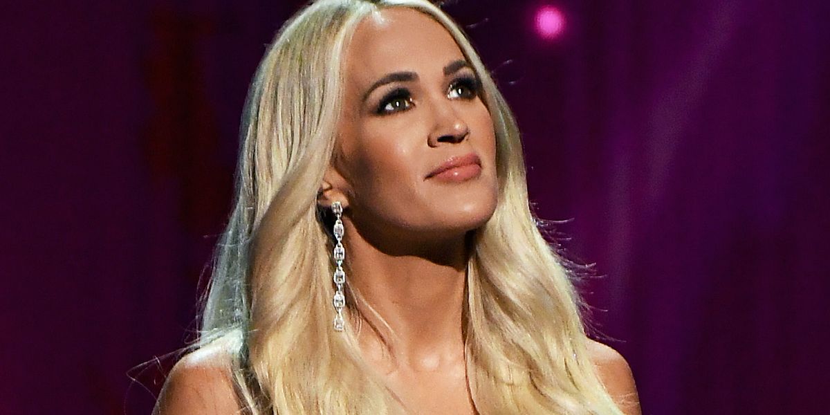 Carrie Underwood Made Many Jaws Drop While Wearing a Fierce, Super Sparkly Gold Gown