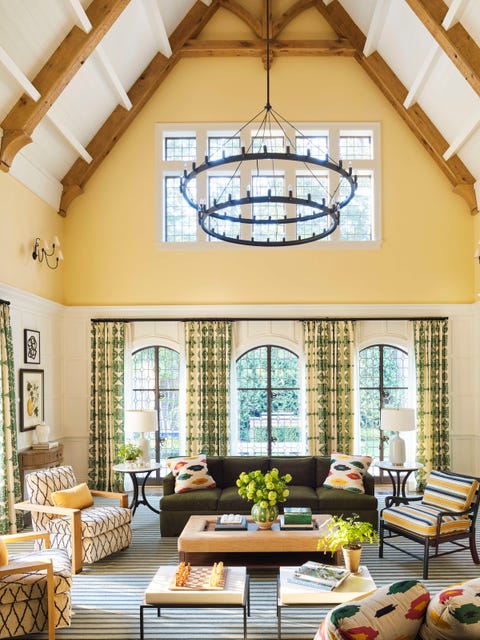 golden walls in the newly added family room are painted white