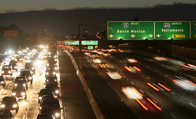 los angeles freeways swarm in the evening darkness