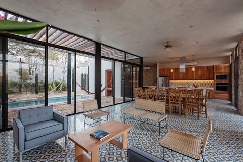 salón, comedor y cocina de diseño diseño industrial con suelo de baldosas geométricas
