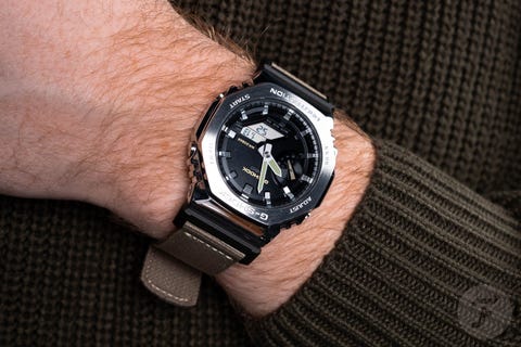 person wearing g shock casioak watch