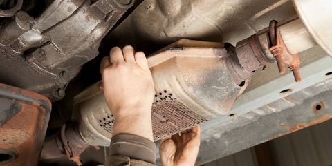 catalytic converter removal at a salvage yard
