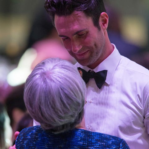 patsy noah and her son adam levine in a tuxedo