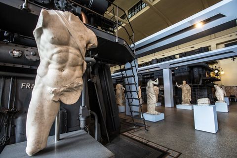 roman statues in contemporary setting