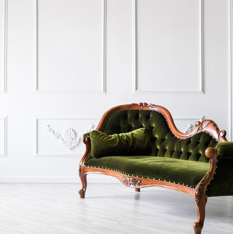 Chair against white wall