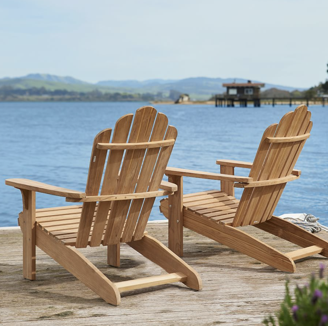 light wood adirondack chairs on dock