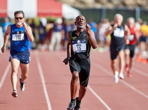charles allie in a race on a track