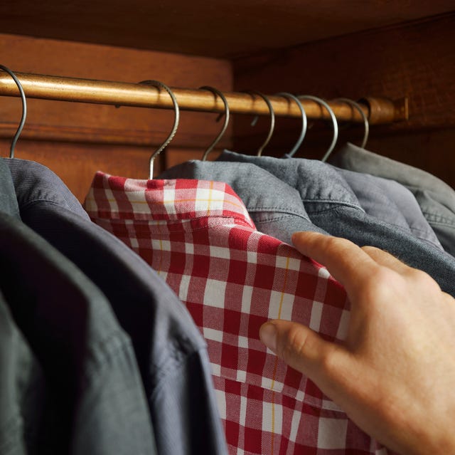 Checked shirt being selected over grey shirts checked shirt being selected over grey shirts